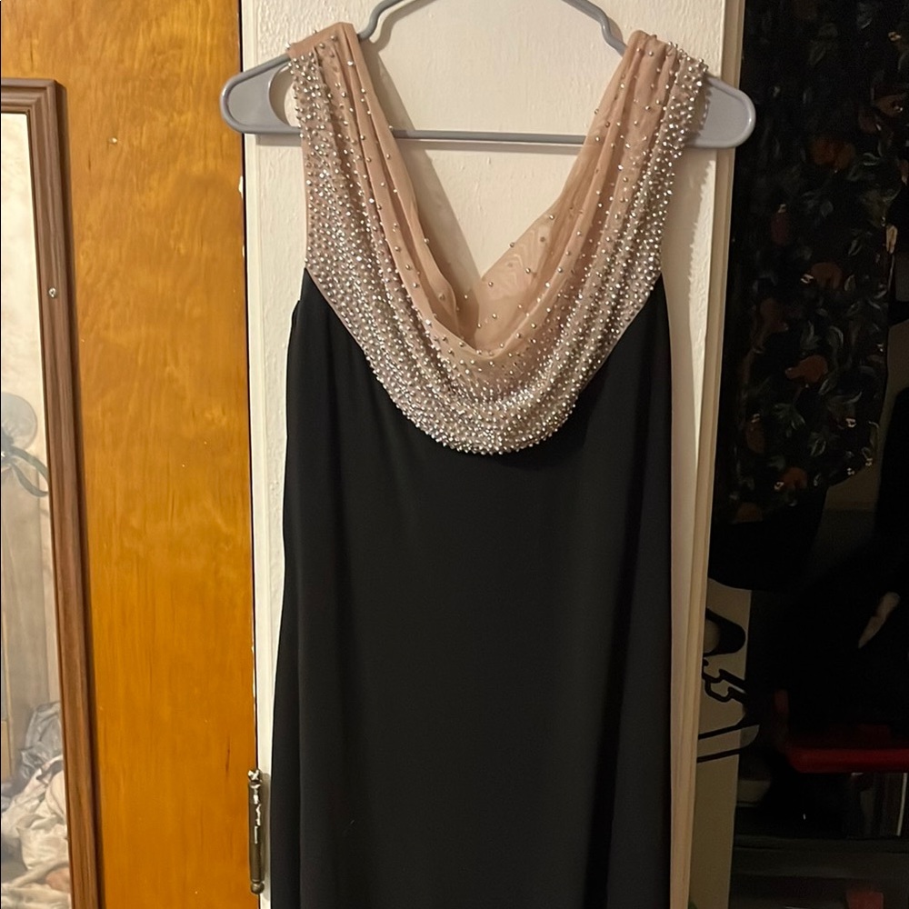 Elegant Black and Cream Dress with Pearl Detailing